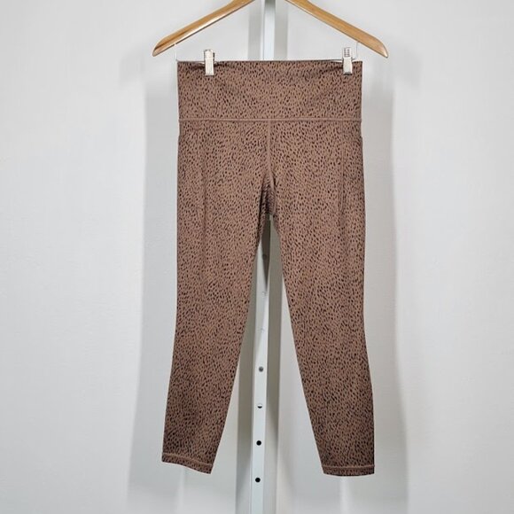 Athleta Pants - ATHLETA  salutation stash pocket II printed 7/8 legging Sz M